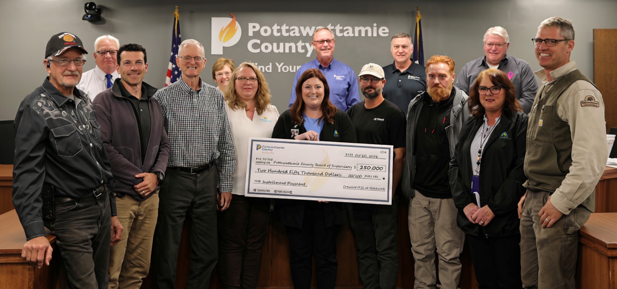 Crescent Hill at Hitchcock team presents check to Board of Supervisors