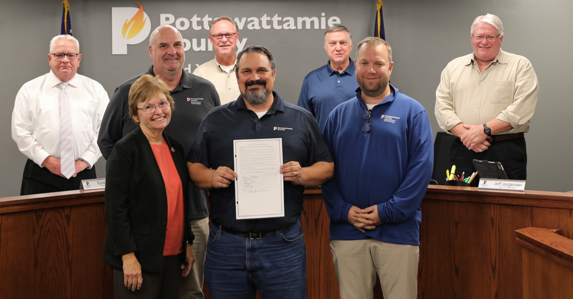 County IT staff with Board of Supervisors and Cybersecurity Awareness Month proclamation