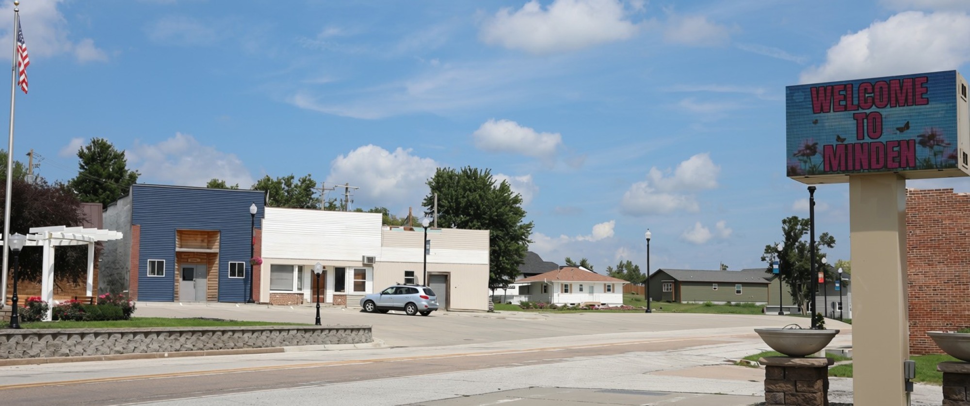 Minden Main Street with Welcome to Minden sign in the forefront