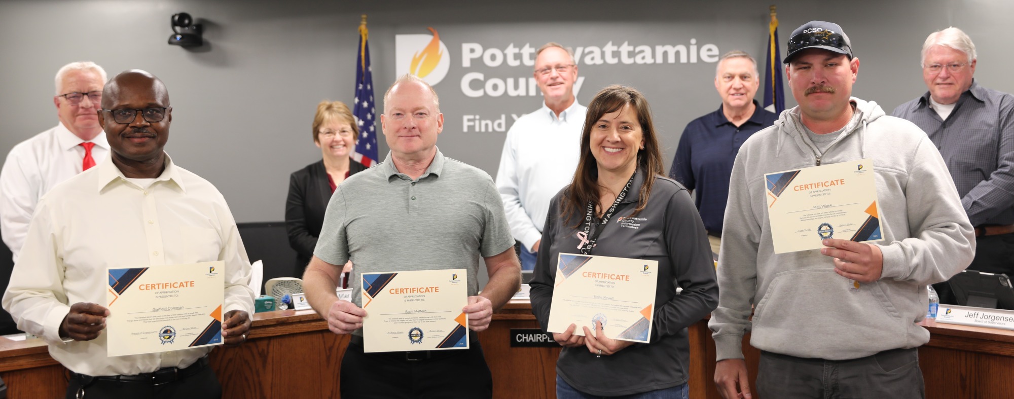 Q1 2026 employee recognition winners with Board of Supervisors