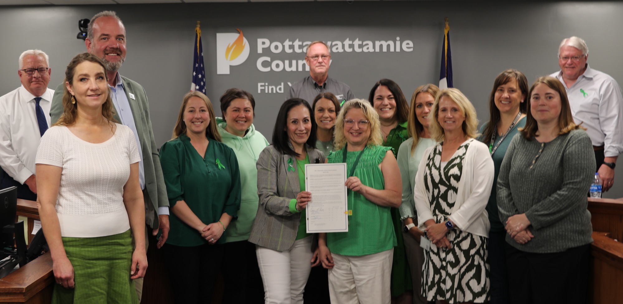 County employees with Board of Supervisors and Mental Health Awareness Month proclamation
