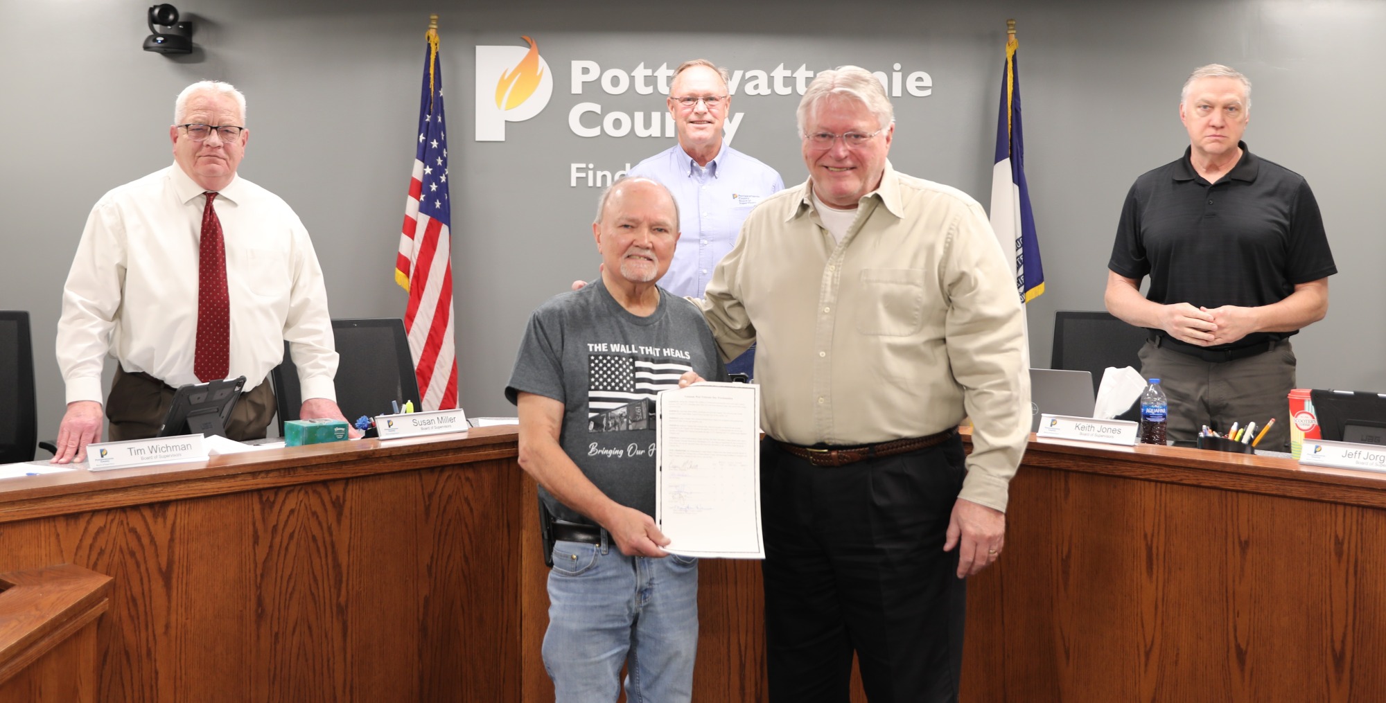 The Wall That Heals committee member with Board of Supervisors and proclamation
