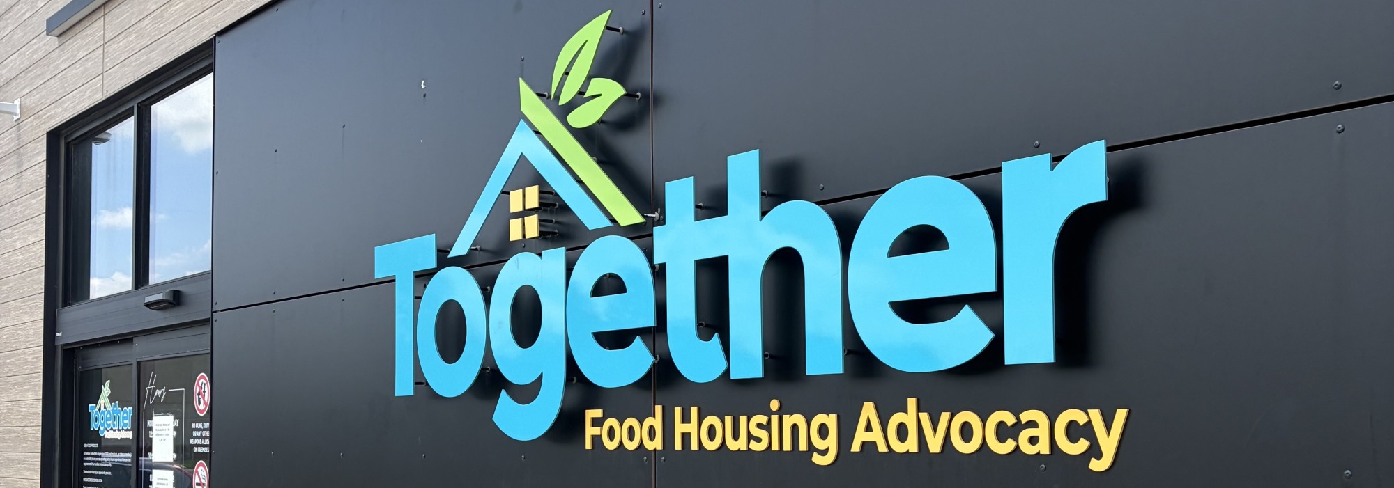 Exterior sign Together Food Housing Advocacy